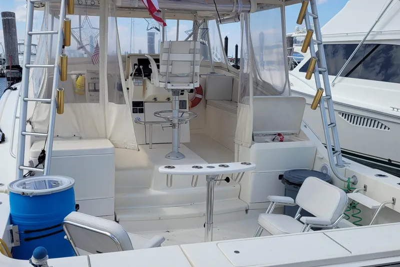 Slide: The Image of 1992 Luhrs 380 Open boat interior with seating and fishing equipment. - 5