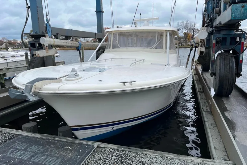 Slide: The Image of 1992 Luhrs 380 Open boat in dry dock, ready for maintenance. - 59