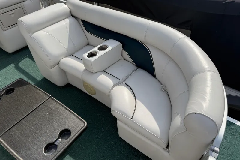Slide: The Image of Luxurious white seating with cup holders on a 2007 Premier 22 boat. - 3