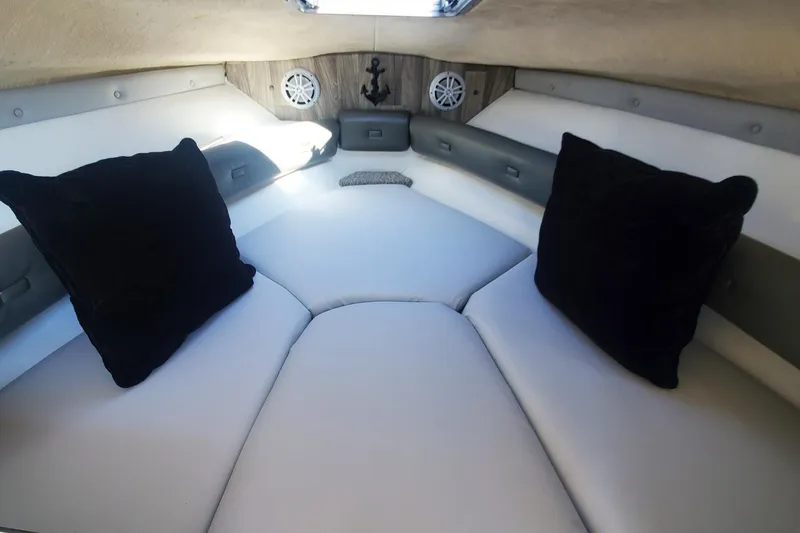Slide: The Image of 1997 Chaparral Signature 240 cabin interior with cushions and anchor decor. - 17