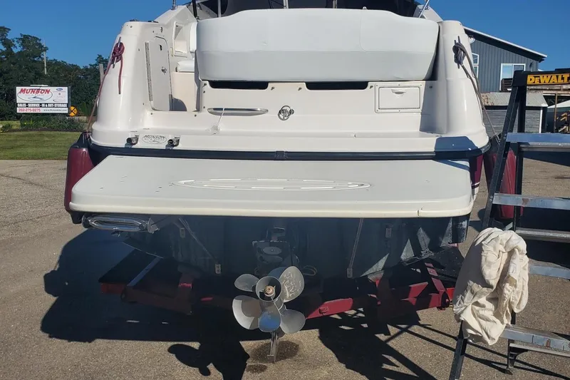 Slide: The Image of 1997 Chaparral Signature 240 boat rear view with propeller and swim platform. - 24