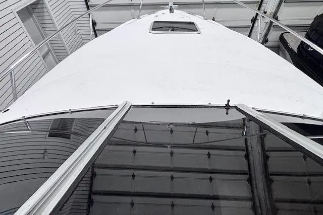 Slide: The Image of 1997 Chaparral Signature 240 boat in storage, viewed from the front. - 42