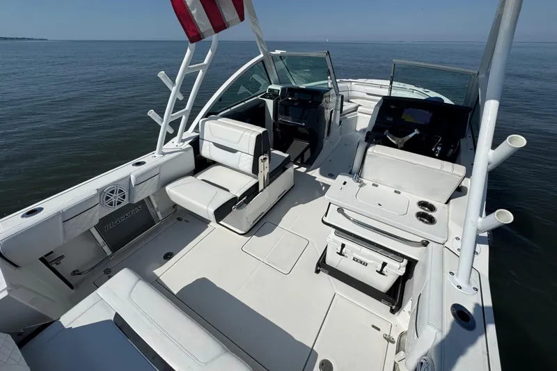 Slide: The Image of 2021 Blackfin 252 DC boat interior with seating and ocean view. - 29