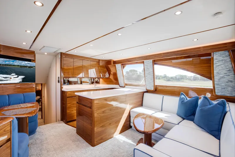Slide: The Image of Luxurious interior of 2025 Viking 48 Convertible yacht with modern furnishings and elegant design. - 12