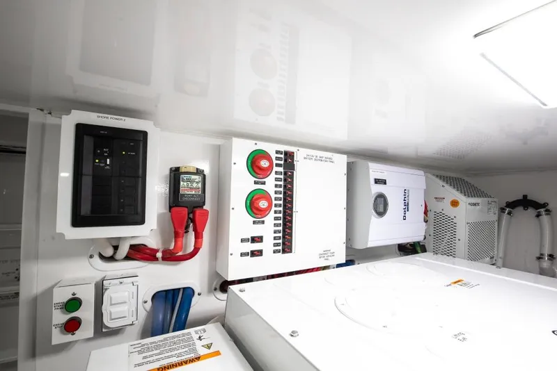 Slide: The Image of Electrical panel in 2025 Viking 48 Convertible yacht engine room. - 48