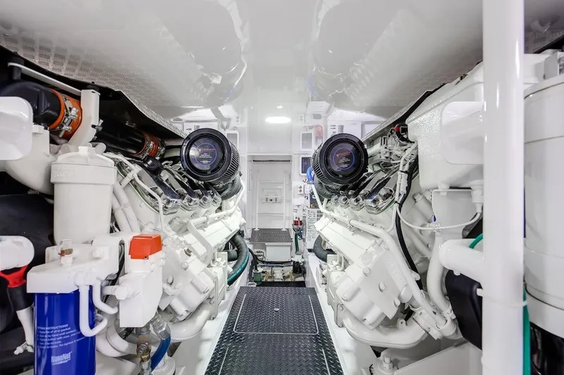 Slide: The Image of Engine room of 2025 Viking 48 Convertible yacht, showcasing dual engines and advanced machinery. - 49