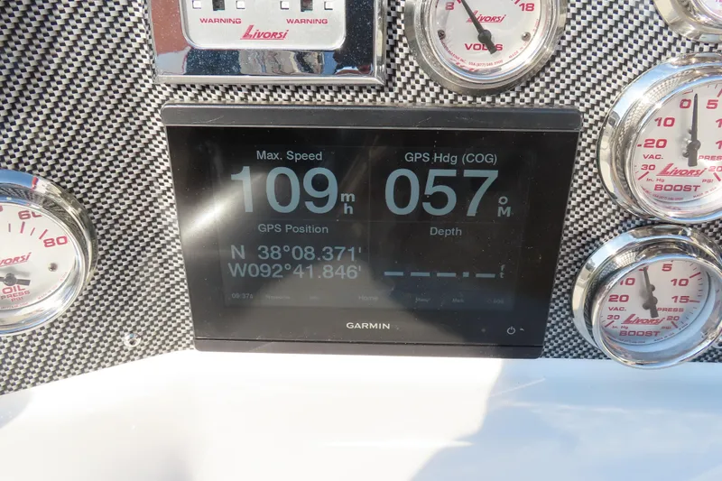 Slide: The Image of Dashboard of 2013 Nordic 39 Poker Run boat with Garmin GPS and Livorsi gauges. - 24