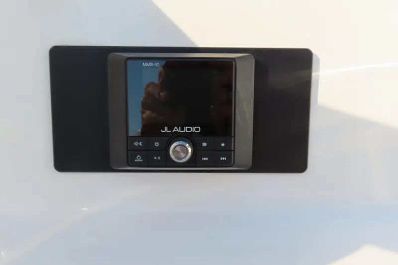 Slide: The Image of JL Audio MMR-40 control panel on 2013 Nordic 39 Poker Run boat. - 31