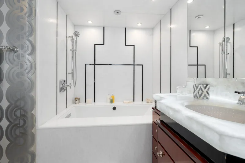 Slide: The Image of Luxurious bathroom in a 1993 Christensen Semi Displacement yacht with modern fixtures. - 13