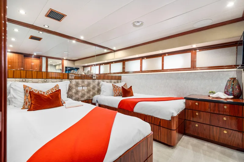 Slide: The Image of Luxurious twin bedroom on 1993 Christensen Semi Displacement yacht with modern decor. - 18
