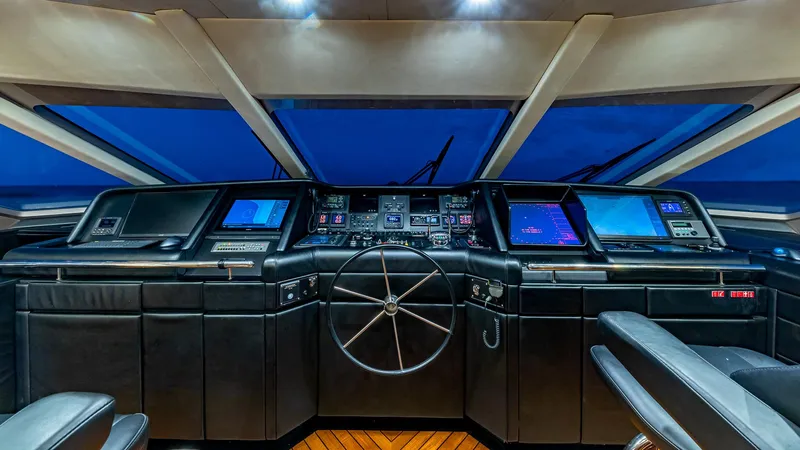 Slide: The Image of Christensen Semi Displacement 1993 yacht helm with advanced navigation systems and panoramic windows. - 24