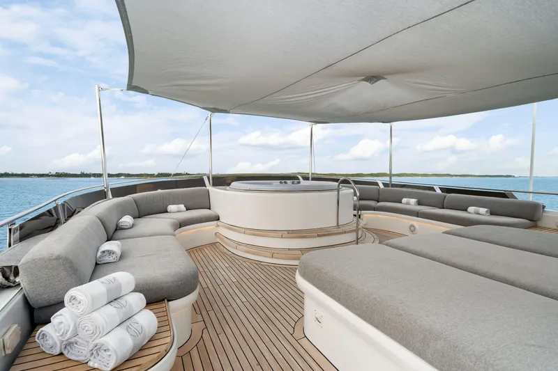 Slide: The Image of Luxurious deck of 1993 Christensen Semi Displacement yacht with sunbeds and hot tub. - 27