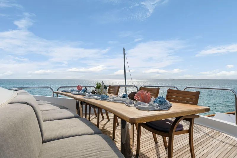 Slide: The Image of Outdoor dining area on 1993 Christensen Semi Displacement yacht with ocean view. - 29