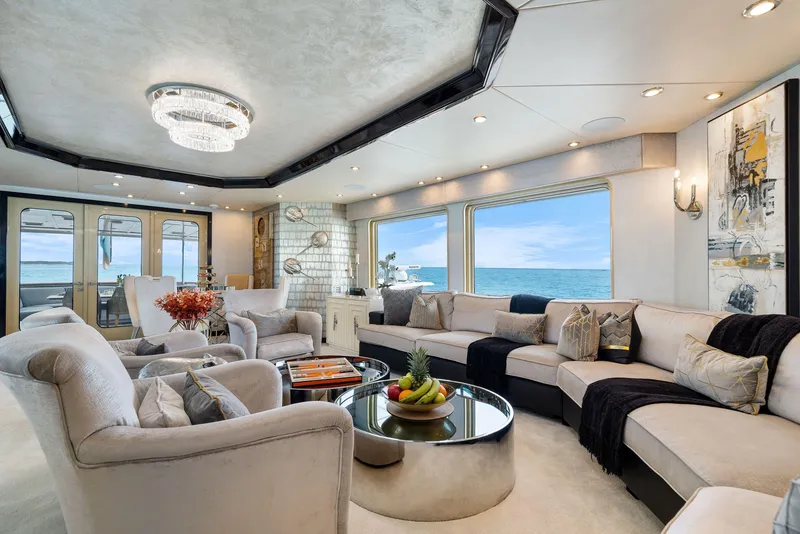 Slide: The Image of Luxurious 1993 Christensen Semi Displacement yacht interior with ocean view, plush seating, and elegant decor. - 3