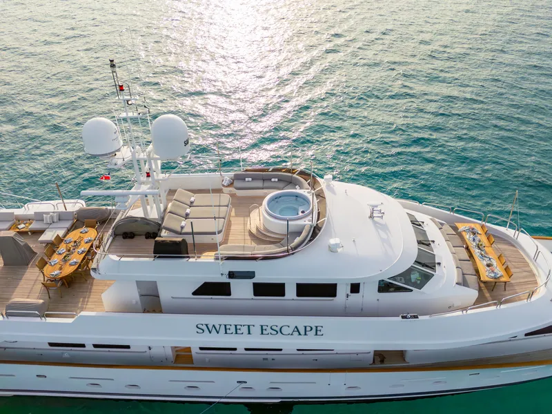 Slide: The Image of Aerial view of 1993 Christensen Semi Displacement yacht Sweet Escape on the water. - 30