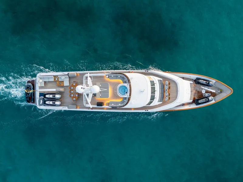 Slide: The Image of Aerial view of 1993 Christensen Semi Displacement yacht cruising on clear blue water. - 36