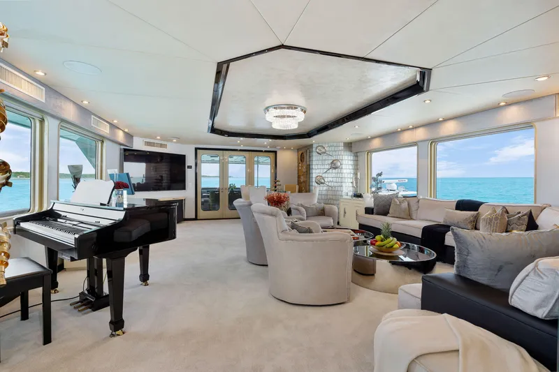 Slide: The Image of Luxurious interior of 1993 Christensen Semi Displacement yacht with grand piano and ocean views. - 4