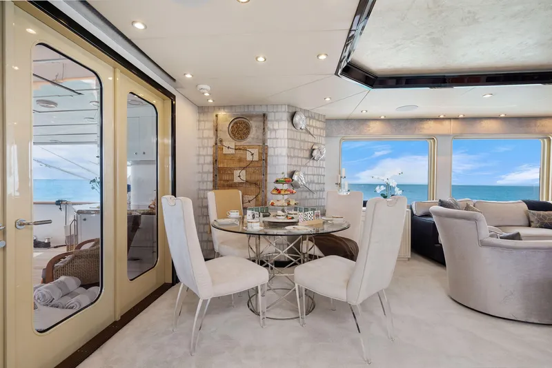 Slide: The Image of Luxurious dining area on a 1993 Christensen Semi Displacement yacht with ocean views. - 5