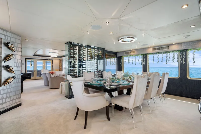 Slide: The Image of Luxurious dining area on a 1993 Christensen Semi Displacement yacht with ocean views. - 6