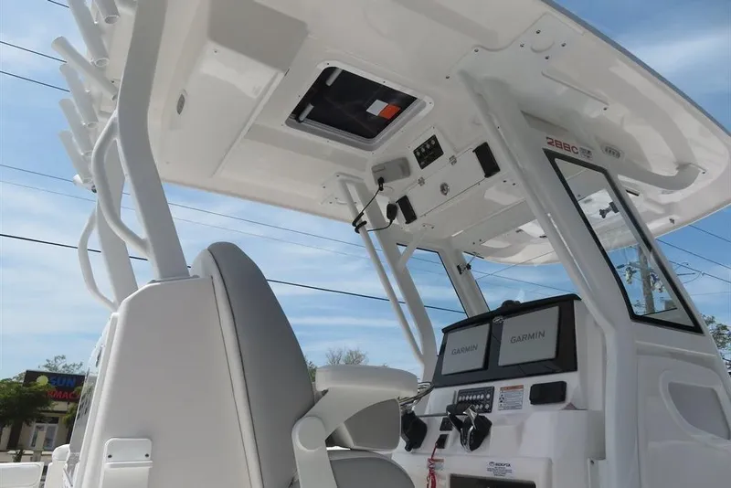 Slide: The Image of 2024 Sea Fox 288 Commander boat interior with Garmin electronics and seating. - 21