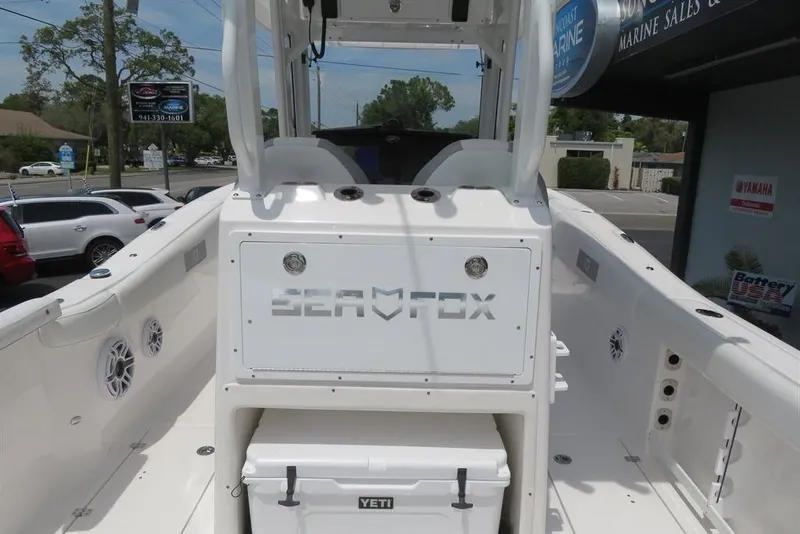 Slide: The Image of 2024 Sea Fox 288 Commander boat interior with Yeti cooler and speakers. - 25