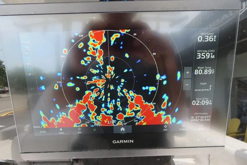 Slide: The Image of Garmin marine radar display on 2024 Sea Fox 288 Commander, showing GPS speed and water temperature. - 31