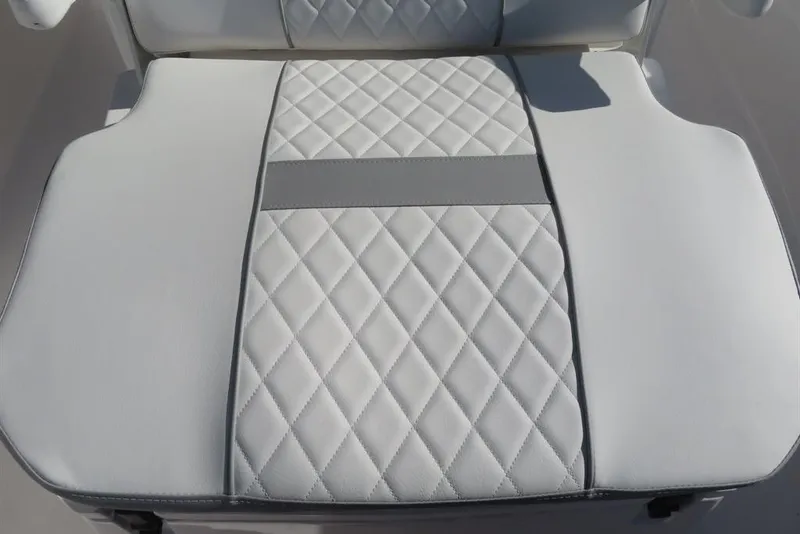 Slide: The Image of 2024 Sea Fox 288 Commander boat seat with diamond-patterned upholstery. - 33