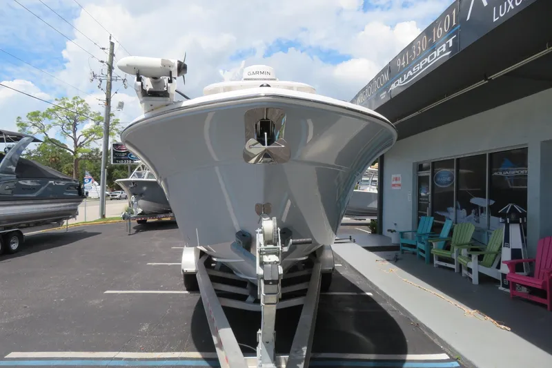 Slide: The Image of 2024 Sea Fox 288 Commander boat on trailer at dealership, front view. - 5