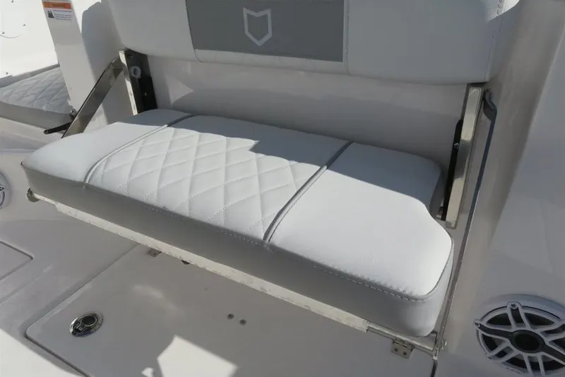 Slide: The Image of 2024 Sea Fox 288 Commander boat seat with quilted white upholstery and stainless steel hardware. - 50