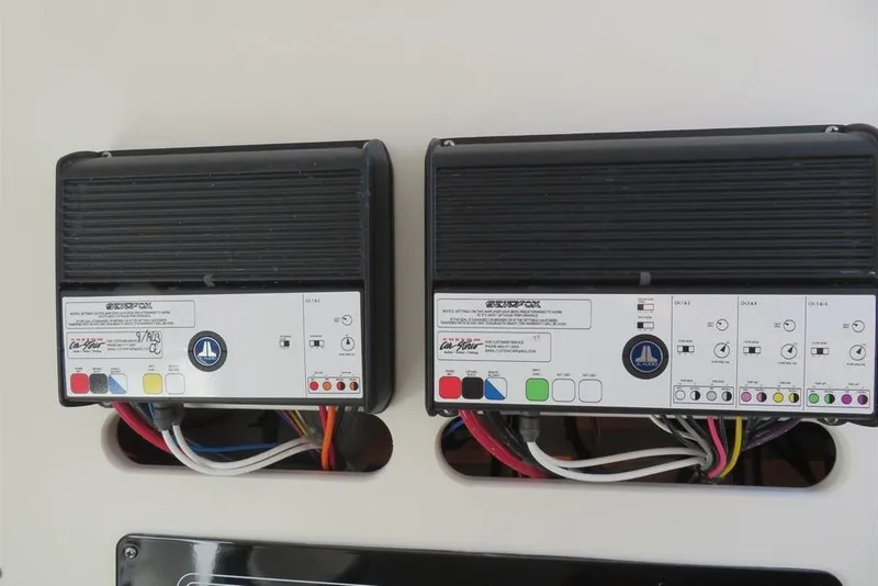 Slide: The Image of 2024 Sea Fox 288 Commander electronic control panels with wiring connections. - 57