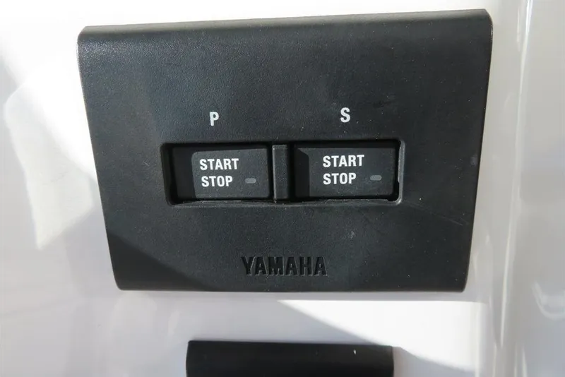 Slide: The Image of Yamaha start-stop buttons on 2024 Sea Fox 288 Commander boat control panel. - 59