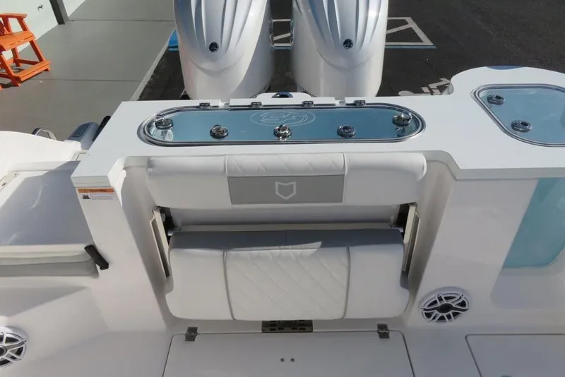 Slide: The Image of 2024 Sea Fox 288 Commander boat with dual engines and sleek seating design. - 63