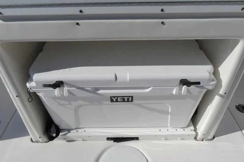 Slide: The Image of YETI cooler on 2024 Sea Fox 288 Commander boat, under-seat storage. - 66
