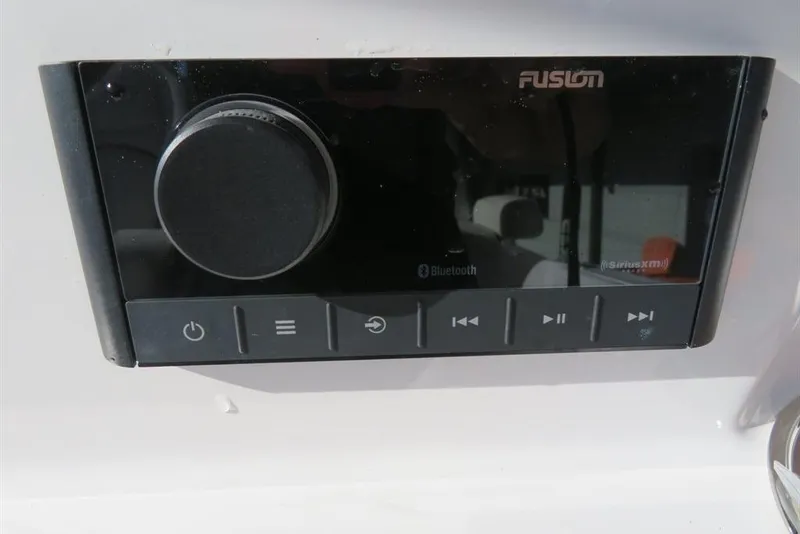 Slide: The Image of Fusion marine audio system on 2024 Sea Fox 288 Commander boat dashboard. - 67