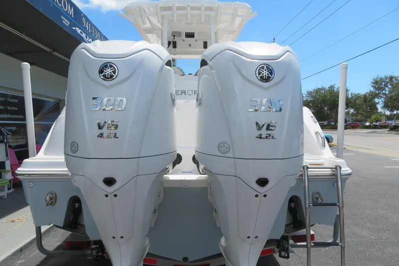 Slide: The Image of 2024 Sea Fox 288 Commander with twin Yamaha 300 V6 outboard engines. - 7