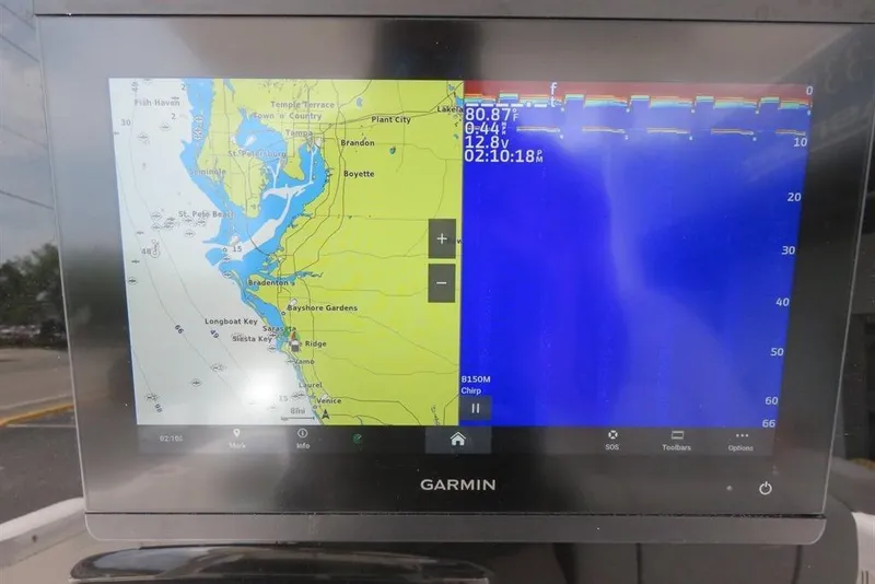 Slide: The Image of Garmin navigation display on 2024 Sea Fox 288 Commander boat, showing map and sonar. - 70