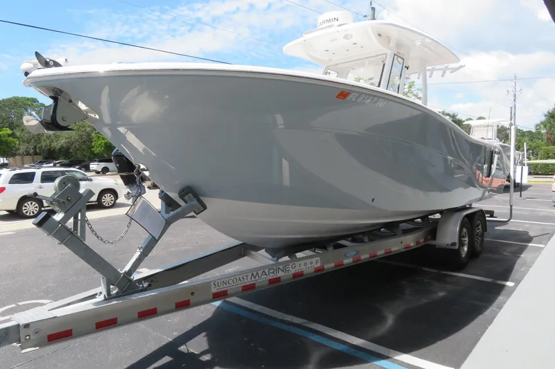 Slide: The Image of 2024 Sea Fox 288 Commander boat on trailer in parking lot. - 9