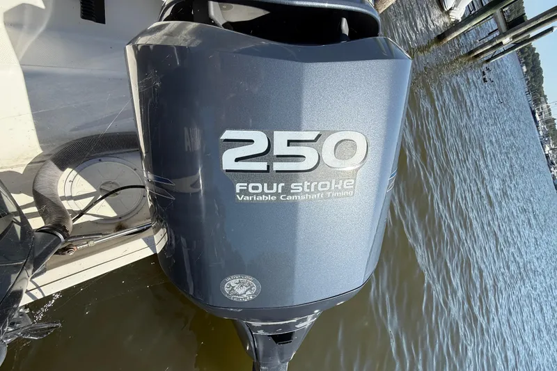 Slide: The Image of Outboard motor on a 2006 Pursuit 3370 Offshore boat, 250 horsepower, four-stroke engine. - 9