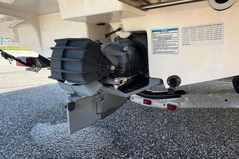 Slide: The Image of 2020 Yamaha Boats SX190 jet drive system on a trailer, detailed view. - 7