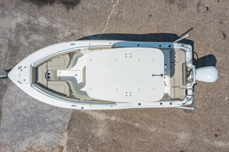 Slide: The Image of Overhead view of 2021 Key West 239 FS boat on concrete surface. - 10