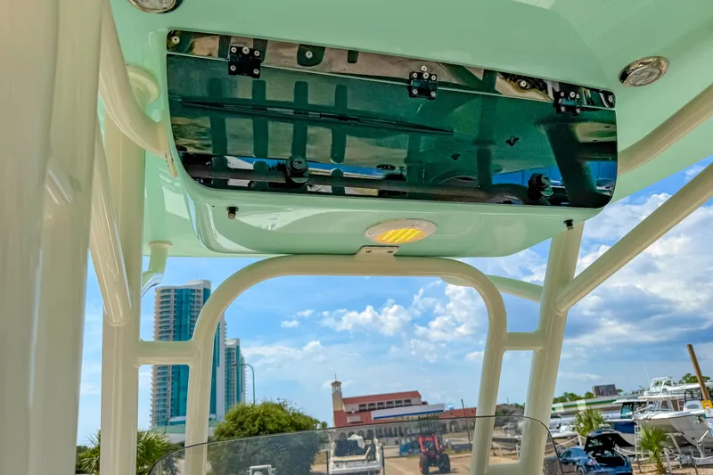 Slide: The Image of 2021 Key West 239 FS boat interior with cityscape and blue sky background. - 16
