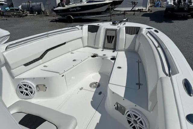 Slide: The Image of 2025 Wellcraft 243 Fisherman boat interior with spacious seating and modern design. - 13