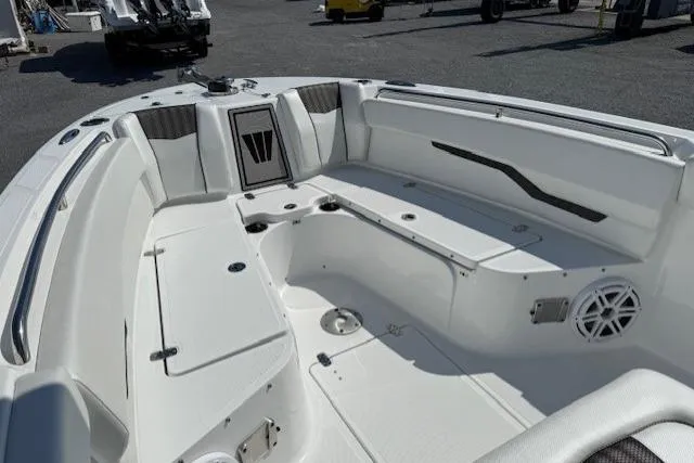 Slide: The Image of 2025 Wellcraft 243 Fisherman boat interior with spacious seating and modern design. - 14