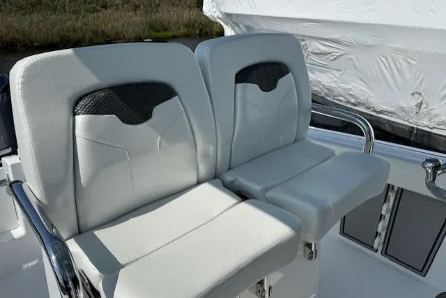 Slide: The Image of 2025 Wellcraft 243 Fisherman boat seats, featuring sleek design and comfortable upholstery. - 7