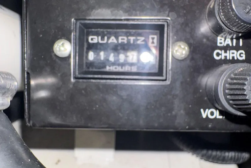 Slide: The Image of Hour meter showing 1497 hours on 2006 Sea Ray 260 Sundancer boat. - 20