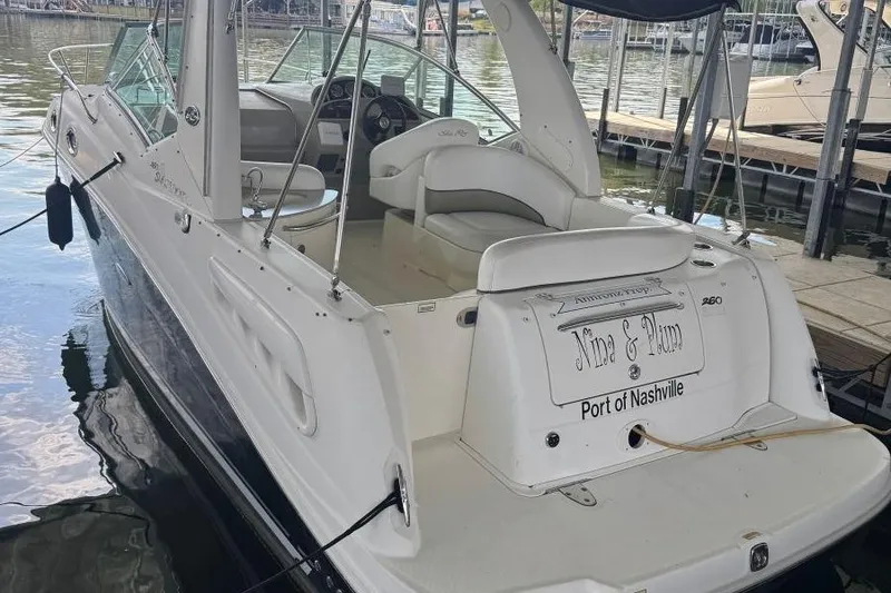 Slide: The Image of 2006 Sea Ray 260 Sundancer docked at marina, rear view, Port of Nashville. - 5