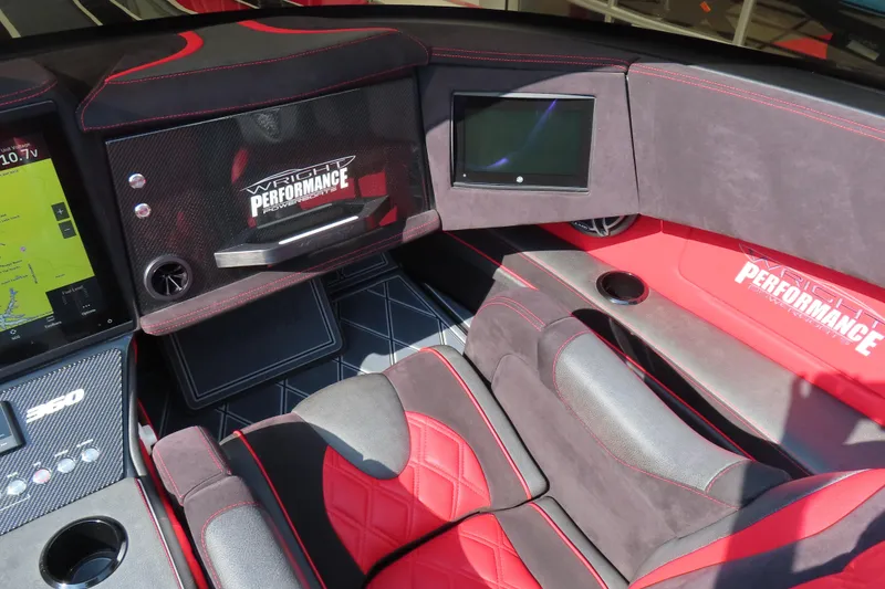 Slide: The Image of Interior of 2021 Wright Performance 360 Carbon boat with red and black seating. - 10