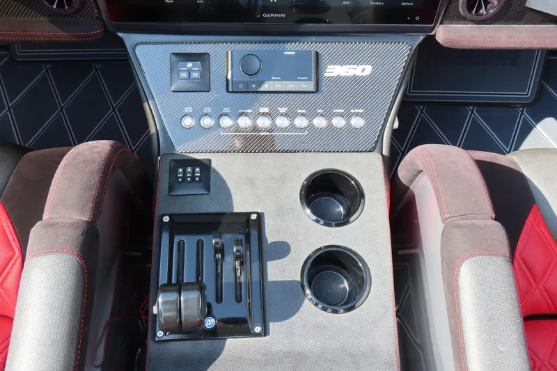 Slide: The Image of Control panel of 2021 Wright Performance 360 Carbon boat with cup holders and switches. - 11
