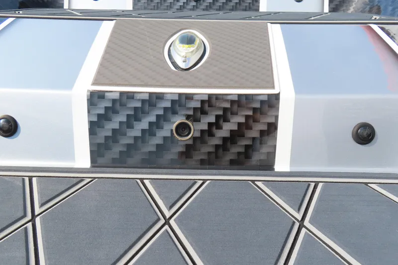 Slide: The Image of 2021 Wright Performance 360 Carbon boat with carbon fiber detailing and geometric deck design. - 17