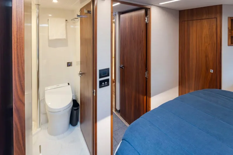 Slide: The Image of Luxurious interior of 2023 Riviera 505 SUV featuring modern bathroom and cozy bedroom. - 28